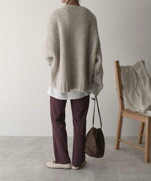 Noëlle | Trendy oversized ivory white sweater with stylish front pocket for an elegant look
